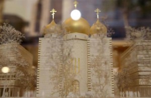 A model of a Russian Orthodox church and spiritual centre is seen during a media presentation at the Russian ambassador's residence in Paris