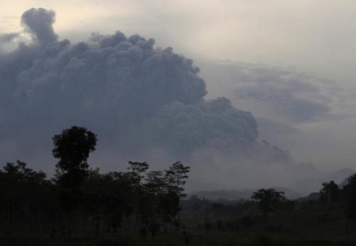 Ash raises from Mount Kelud's eruption, as seen from Sugih Waras village
