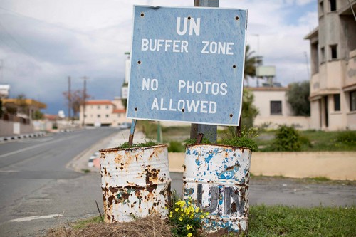 A sign marking the boundary of the UN buffer zone in Pyla, Cyprus