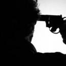 άντρας με όπλο