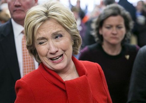 UNITED STATES - JANUARY 24 - Democratic presidential candidate Hillary Rodham Clinton winks as she greets supporters after a Get Out the Caucus event with Sen. Cory Booker, D-N.J., at Vernon Middle School, in Marion, Iowa, Sunday, Jan. 24, 2016. (Photo By Al Drago/CQ Roll Call) (CQ Roll Call via AP Images)