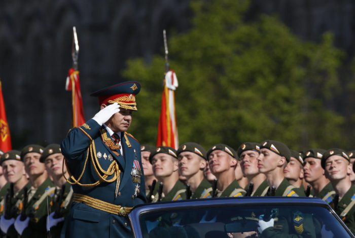 Russian Defence Minister Sergei Shoigu (front L) salutes during the Victory Day parade in Moscow's Red Square May 9, 2014. Russia celebrates the 1945 victory over Nazi Germany on May 9. REUTERS/Sergei Karpukhin (RUSSIA - Tags: POLITICS MILITARY ANNIVERSARY)
