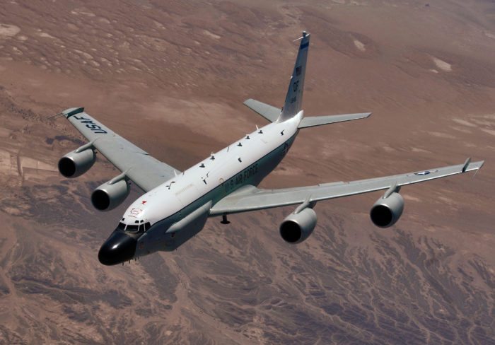RC-135 Rivet Joint reconnaissance aircraft moves into position behind a KC-135T/R Stratotanker for an aerial refueling at a speed greater than 250 knots over Southwest Asia. When connected to the refueling boom, the aircraft will receive more than 40,000 pounds of fuel allowing it to remain on station or move on to other stations to perform its mission. The RC-135 flightcrew of Capt. Mike Edmondson, pilot; 1st Lt. Erik Todoroff, copilot; and 1st Lt. Chris Young, navigator are deployed to the 763rd Expeditionary Reconnaissance Squadron, in Southwest Asia, from 343rd Reconnaissance Squadron, Offutt Air Force Base, Neb. They are natives of East Moline, Il., Jackson, Mich., and Charleston S.C.. (U.S. Air Force photo by Master Sgt. Lance Cheung)
