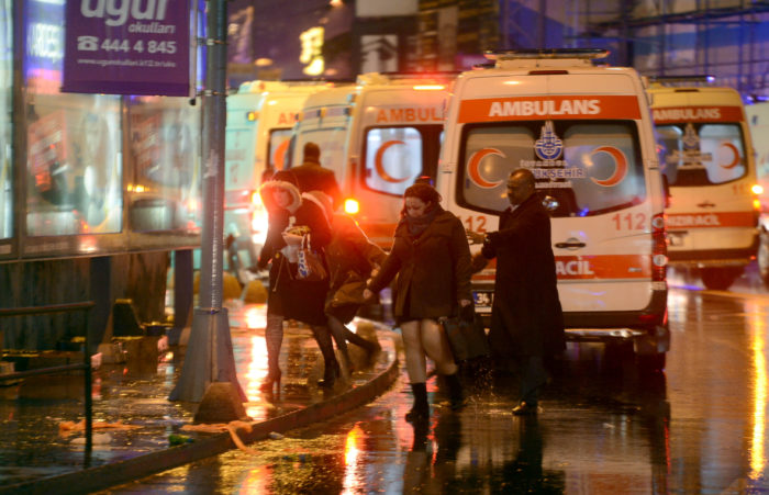 People run away from a nightclub where a gun attack took place during a New Year party in Istanbul, Turkey, January 1, 2017.Ismail Coskun/Ihlas News Agency via REUTERS ATTENTION EDITORS - THIS PICTURE WAS PROVIDED BY A THIRD PARTY. FOR EDITORIAL USE ONLY. NO RESALES. NO ARCHIVE. TURKEY OUT. NO COMMERCIAL OR EDITORIAL SALES IN TURKEY. TPX IMAGES OF THE DAY