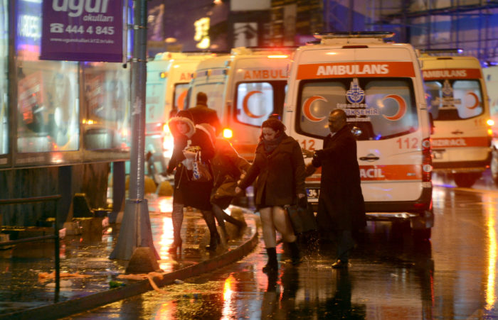 People run away from a nightclub where a gun attack took place during a New Year party in Istanbul, Turkey, January 1, 2017.Ismail Coskun/Ihlas News Agency via REUTERS ATTENTION EDITORS - THIS PICTURE WAS PROVIDED BY A THIRD PARTY. FOR EDITORIAL USE ONLY. NO RESALES. NO ARCHIVE. TURKEY OUT. NO COMMERCIAL OR EDITORIAL SALES IN TURKEY. TPX IMAGES OF THE DAY
